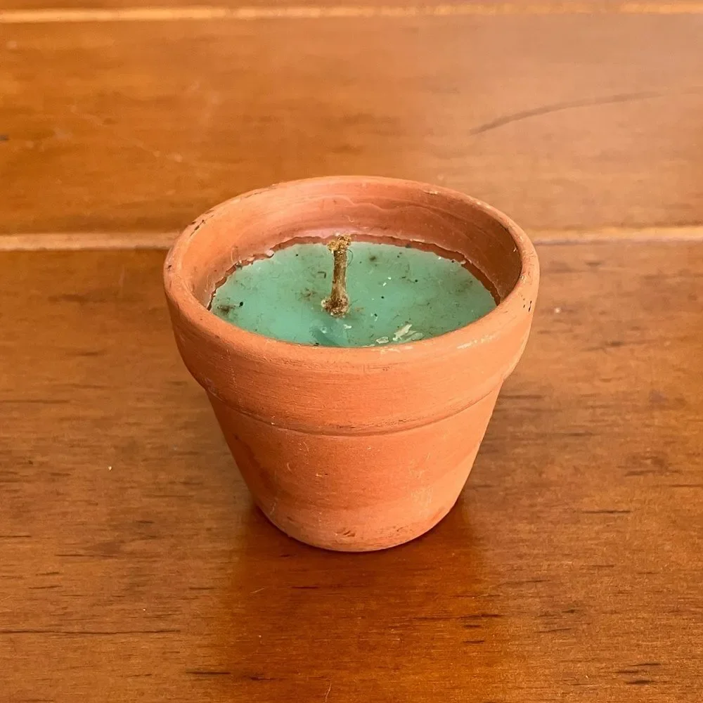 New Green Candle in Garden Pot Holder